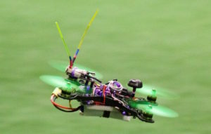 Quad in flight at a local race